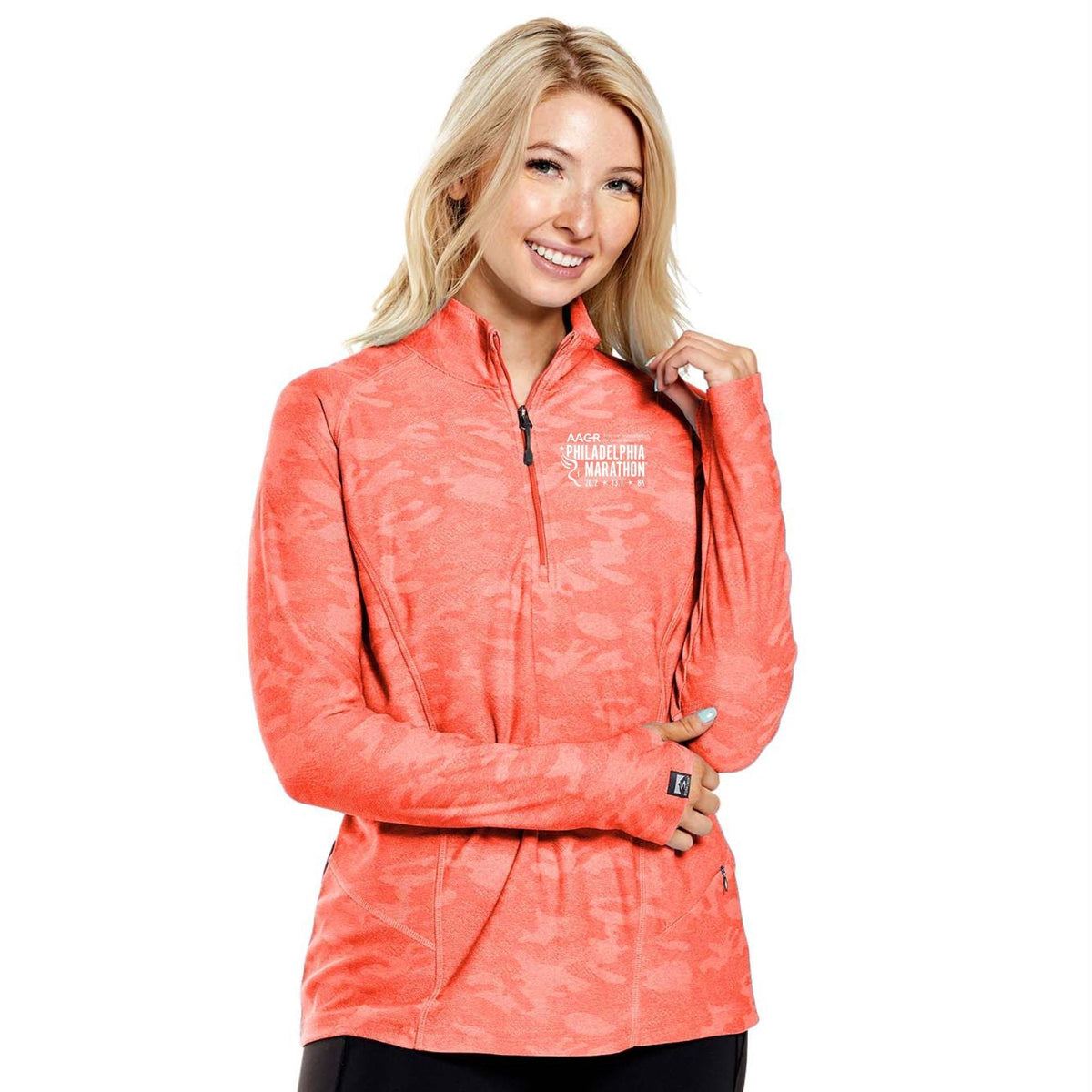 Limited Edition AACR Philadelphia Marathon Sustainably produced Embroidery. Camo jacquard 30% Recycled Poly/70% Poly stretch moisture-wicking fabric, featuring 30+ UPF sun protection, thumbholes, raglan sleeves, hidden zip security pocket, chin guard, and drop tail. Item ID pmle523181w